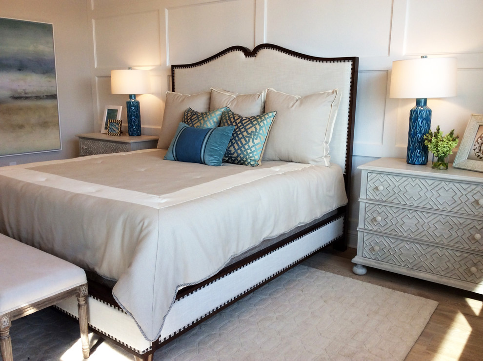 Example of a transitional bedroom design in Miami