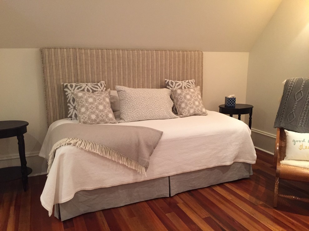Traditional guest bedroom in Charleston with beige walls and medium hardwood flooring.