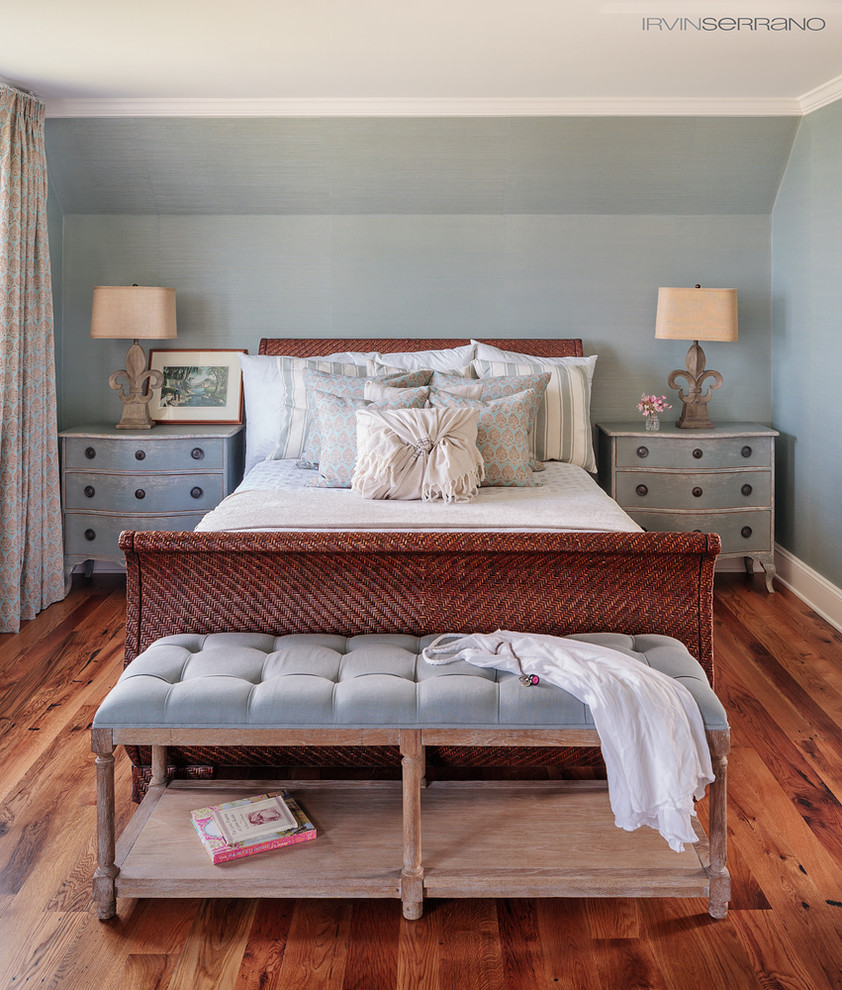 Bedroom - large coastal guest medium tone wood floor bedroom idea in Portland Maine with blue walls and no fireplace