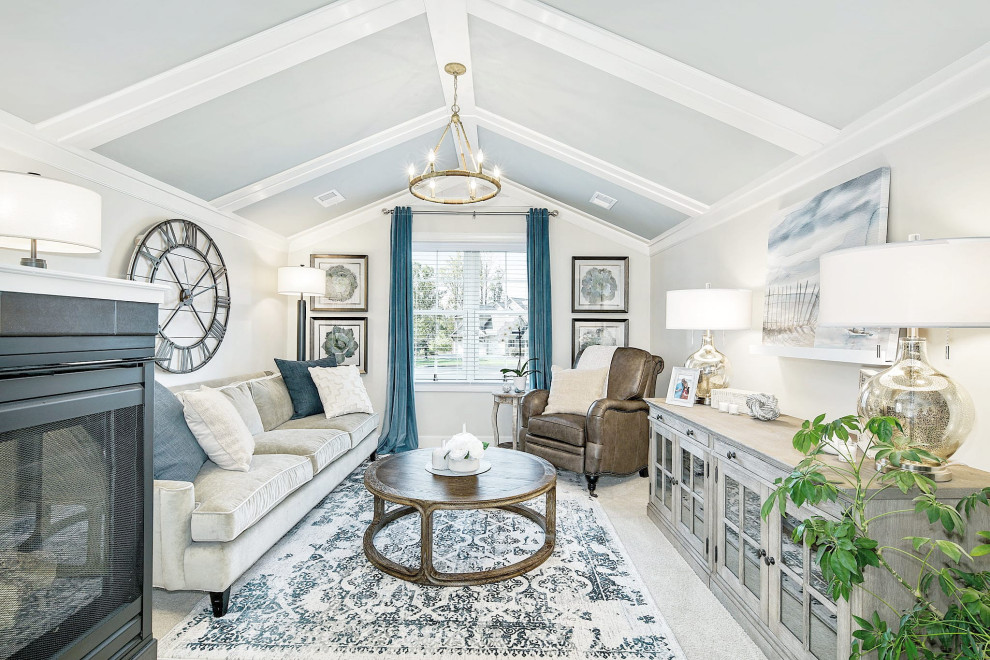 Inspiration for an expansive nautical master bedroom in Philadelphia with beige walls, carpet, a two-sided fireplace, a tiled fireplace surround, beige floors, a vaulted ceiling and wood walls.