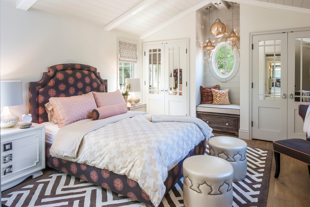 Inspiration for a coastal dark wood floor bedroom remodel in Los Angeles with white walls