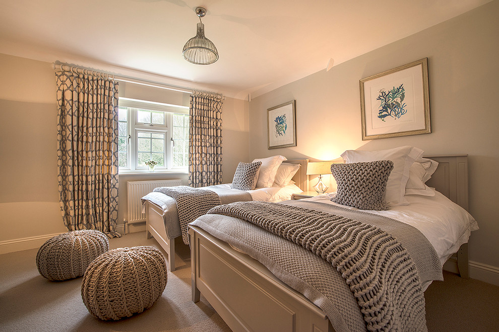 This is an example of a contemporary bedroom in Hampshire with feature lighting.