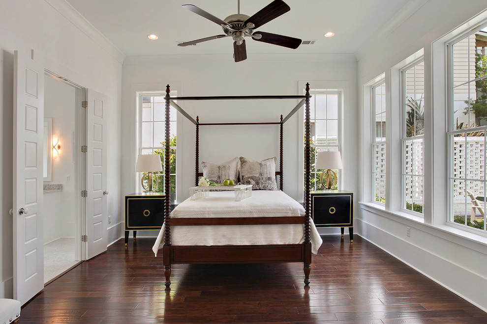 Inspiration for a large timeless master dark wood floor bedroom remodel in New Orleans with white walls and no fireplace