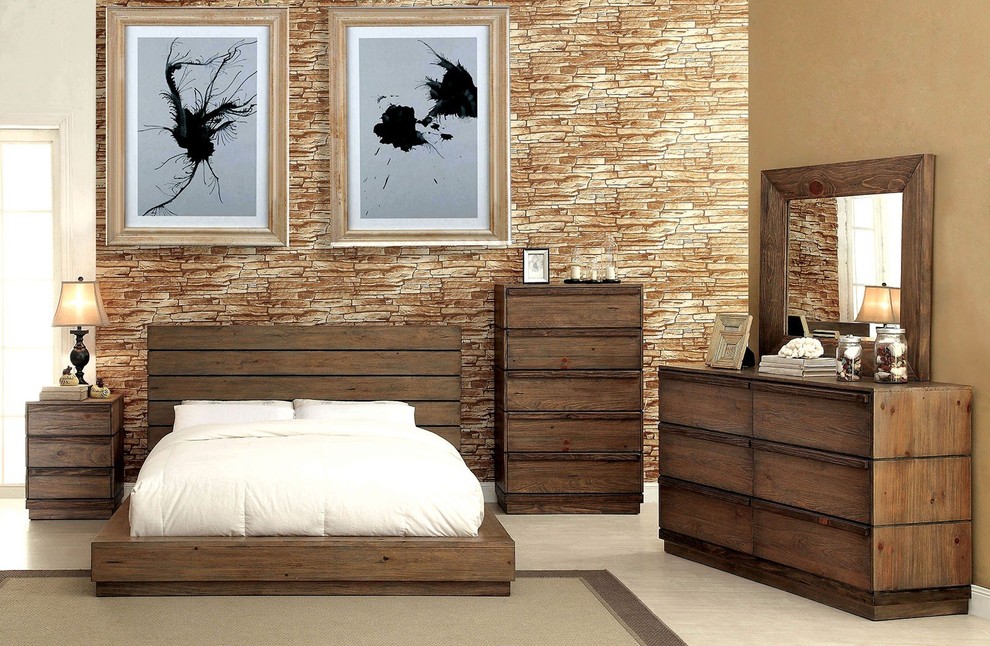 На фото: спальня на антресоли в стиле рустика с коричневыми стенами, темным паркетным полом, печью-буржуйкой и фасадом камина из дерева