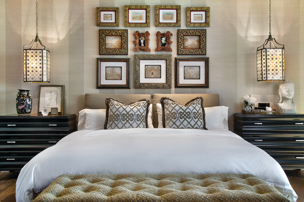Contemporary bedroom in Miami with beige walls and dark hardwood flooring.