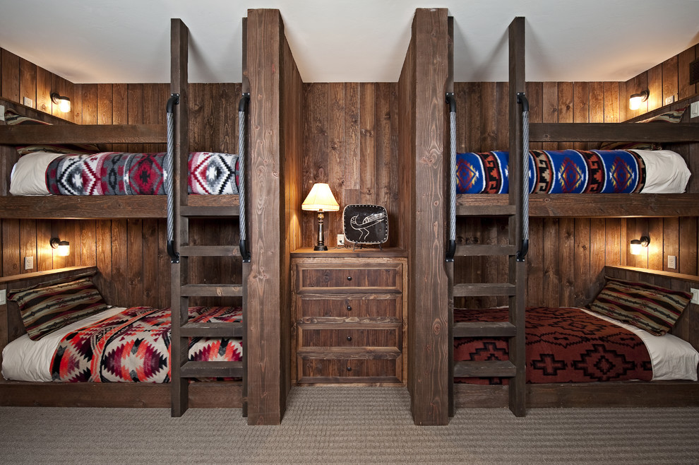 This is an example of a rustic guest bedroom in Denver.