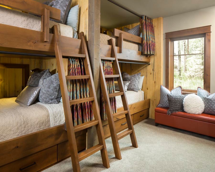 Design ideas for a medium sized rustic guest bedroom in Denver with beige walls, carpet, no fireplace and beige floors.