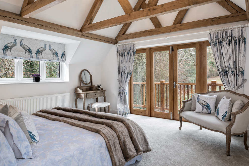 This is an example of a rustic guest bedroom in Berkshire with white walls, carpet and white floors.
