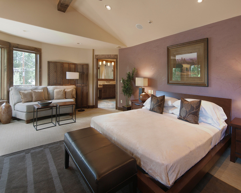 Photo of a contemporary bedroom in Denver with purple walls.