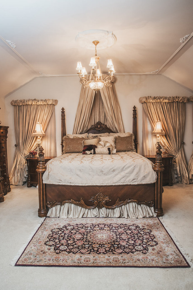 Inspiration for a medium sized traditional master bedroom in New York with beige walls, carpet and beige floors.