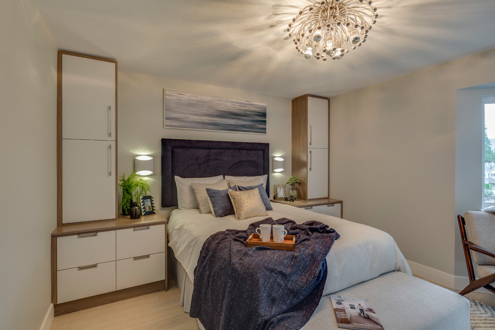This is an example of a medium sized classic master bedroom in Vancouver with grey walls, light hardwood flooring, no fireplace and beige floors.