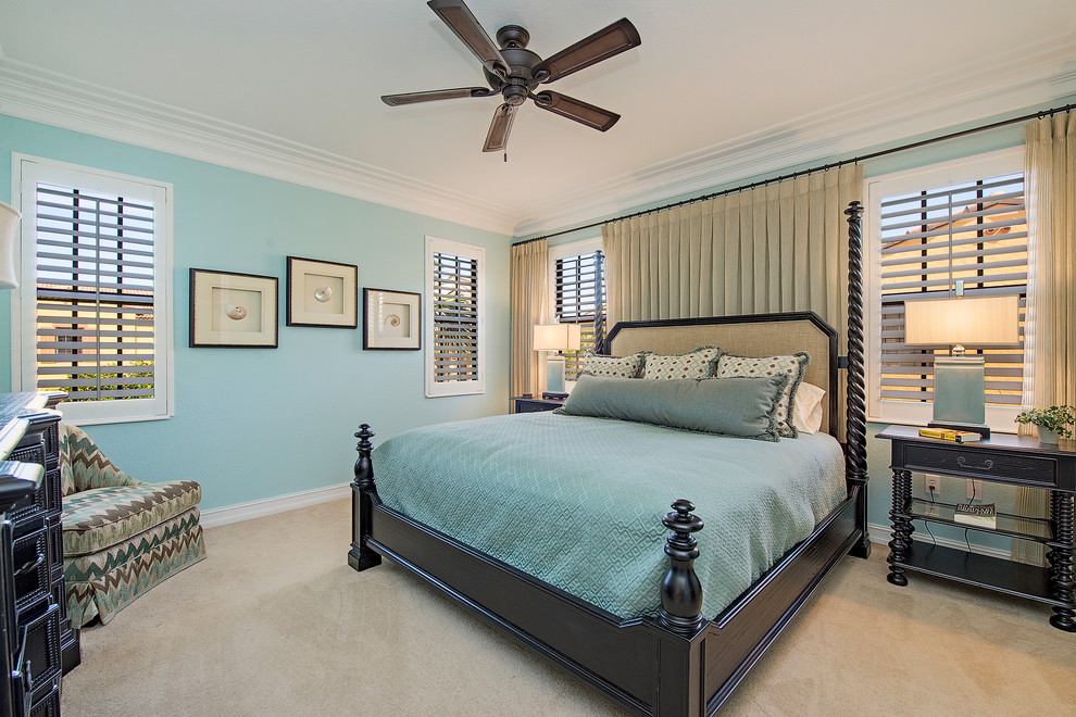 Inspiration for a medium sized nautical master bedroom in Miami with blue walls, carpet, no fireplace and beige floors.