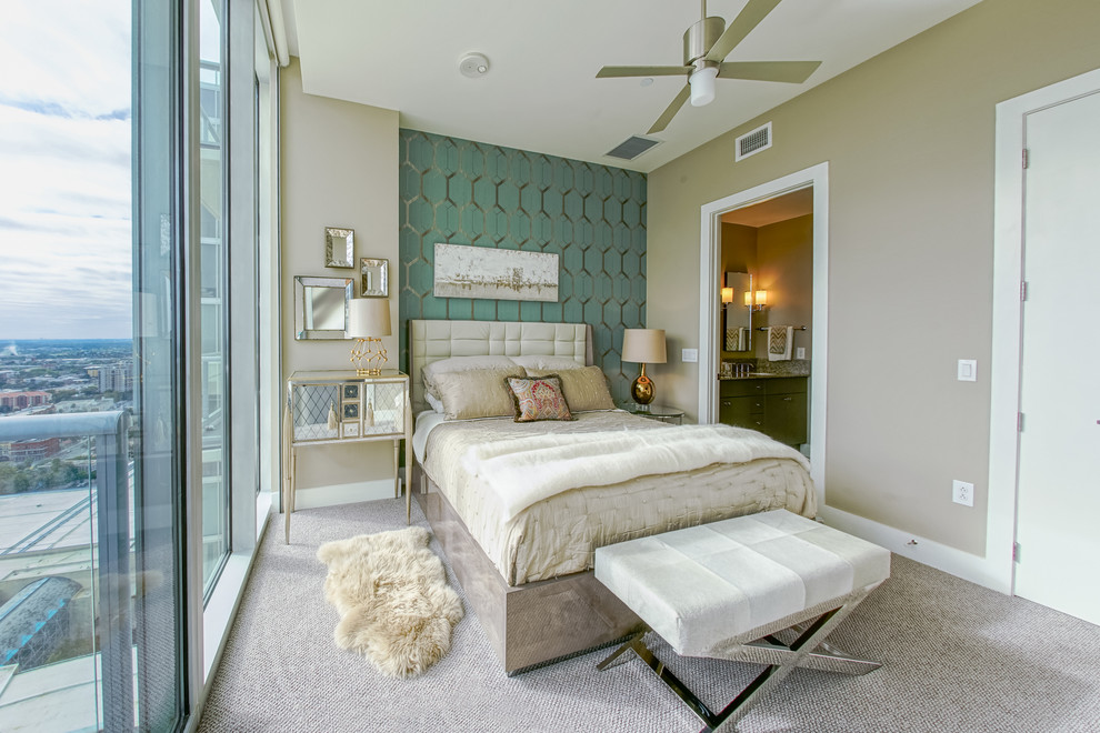Example of a small transitional master carpeted bedroom design in Austin with green walls