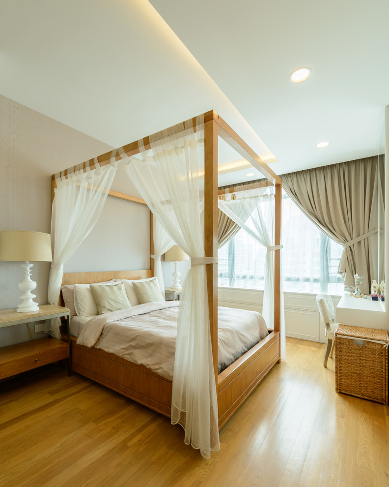 Bedroom - transitional master light wood floor bedroom idea in Singapore with no fireplace