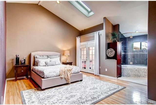Bedroom - modern bedroom idea in Denver