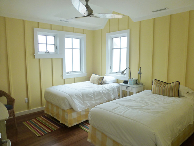 Example of a beach style bedroom design in New York