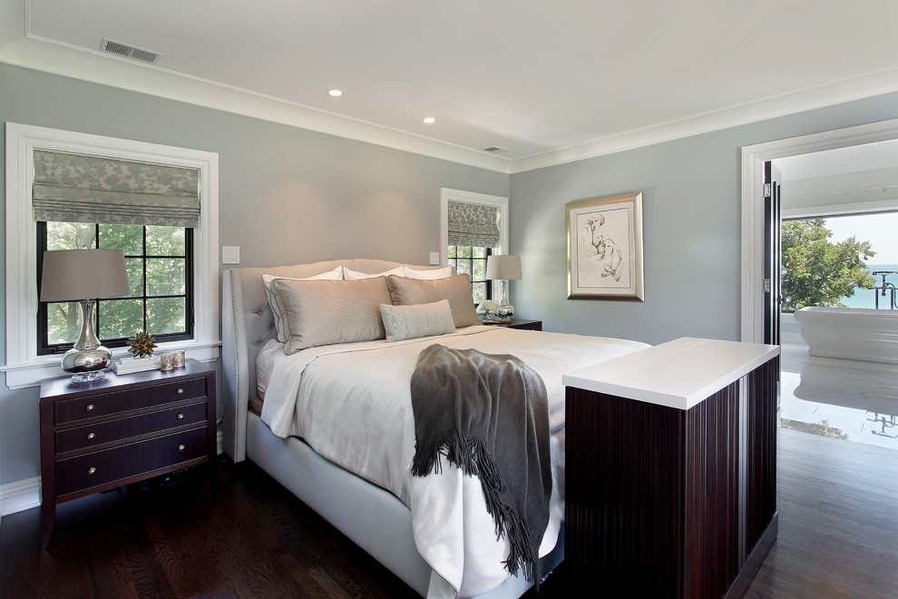 Inspiration for a contemporary dark wood floor bedroom remodel in Other with gray walls