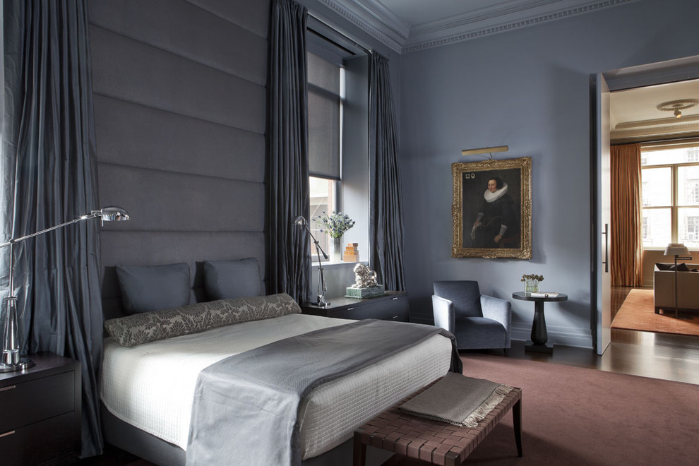 Imagen de dormitorio contemporáneo con paredes azules