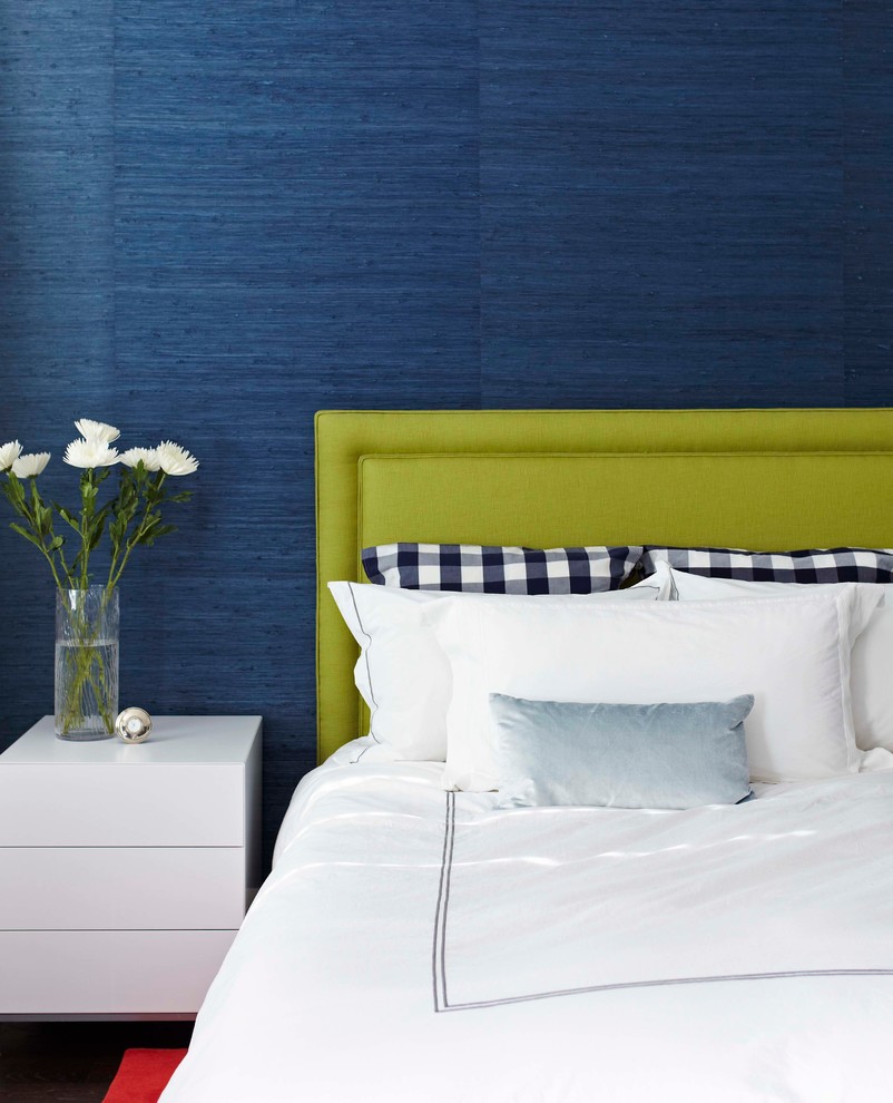Example of a trendy bedroom design in Toronto with blue walls