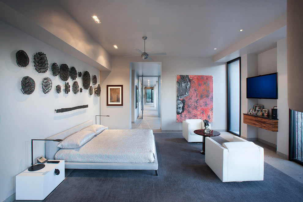 Inspiration for a large contemporary master bedroom in Phoenix with white walls.