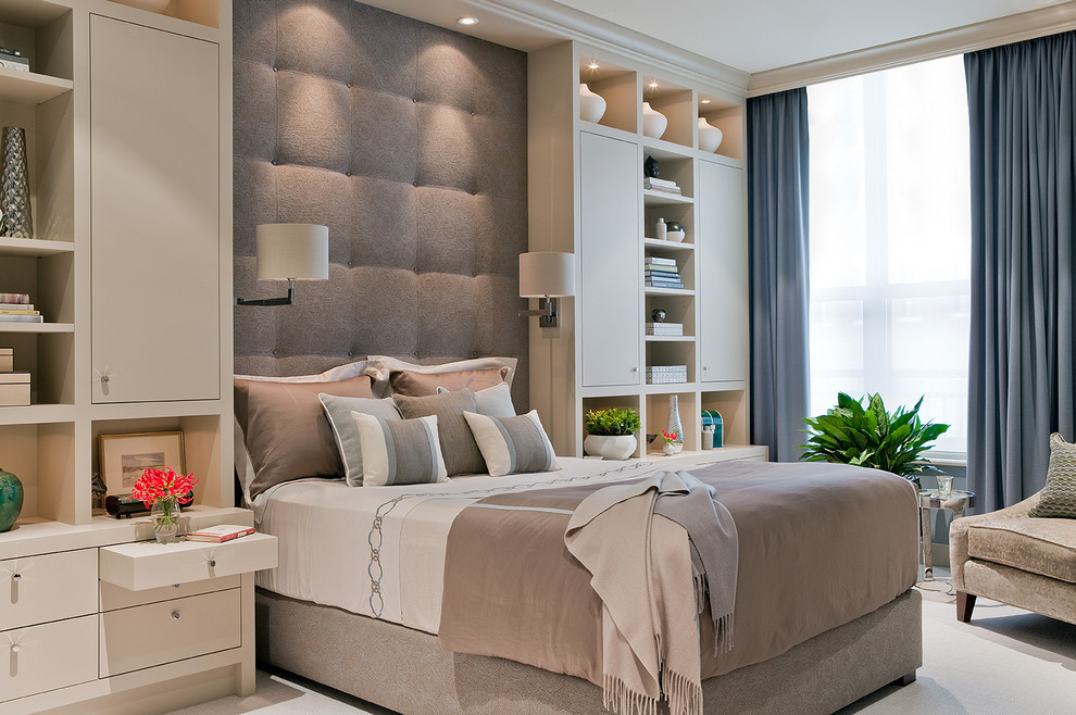 Contemporary master bedroom in Boston with beige walls, carpet and feature lighting.