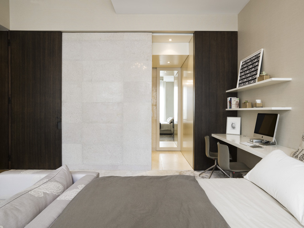 Inspiration for a contemporary bedroom in New York with beige walls.