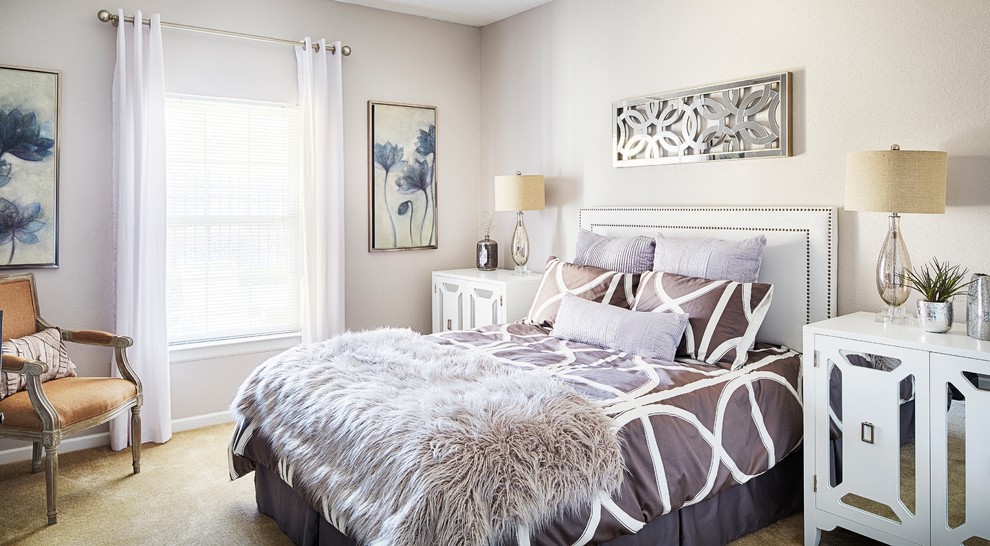 Example of a trendy carpeted bedroom design in Kansas City with gray walls