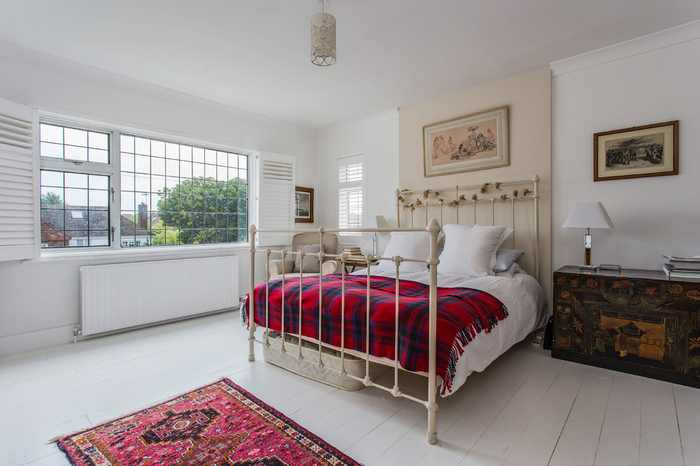 This is an example of an eclectic bedroom in Sussex.