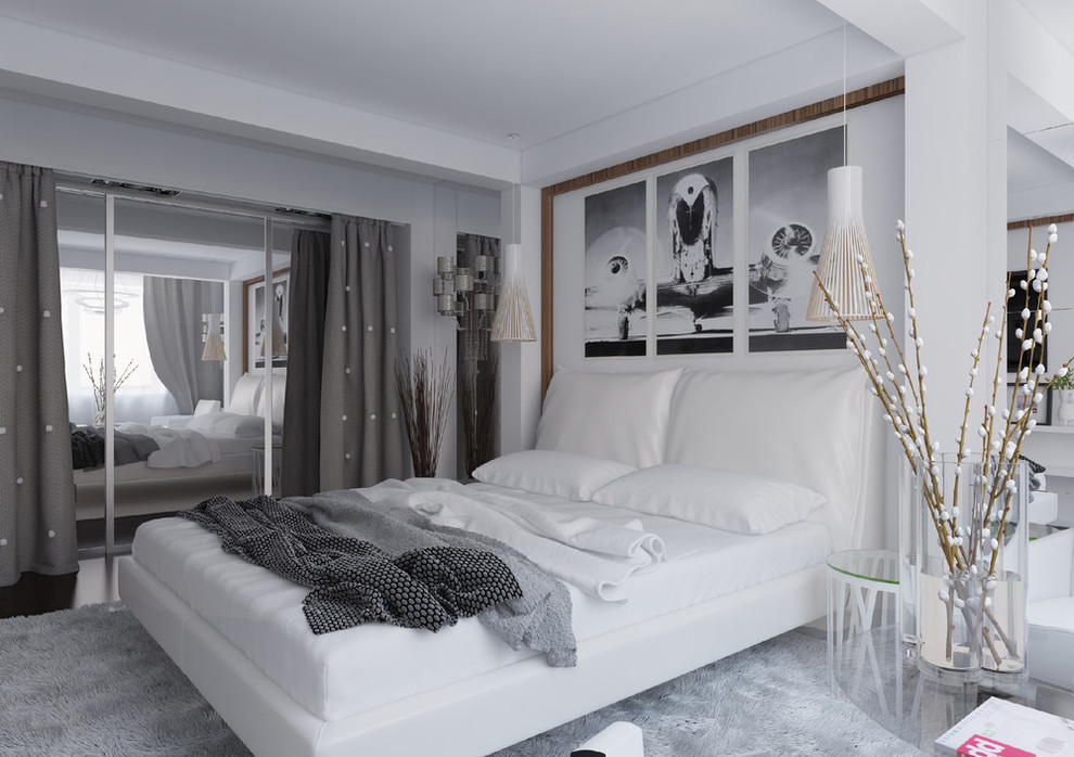 Imagen de dormitorio principal actual pequeño con paredes grises y suelo de madera oscura