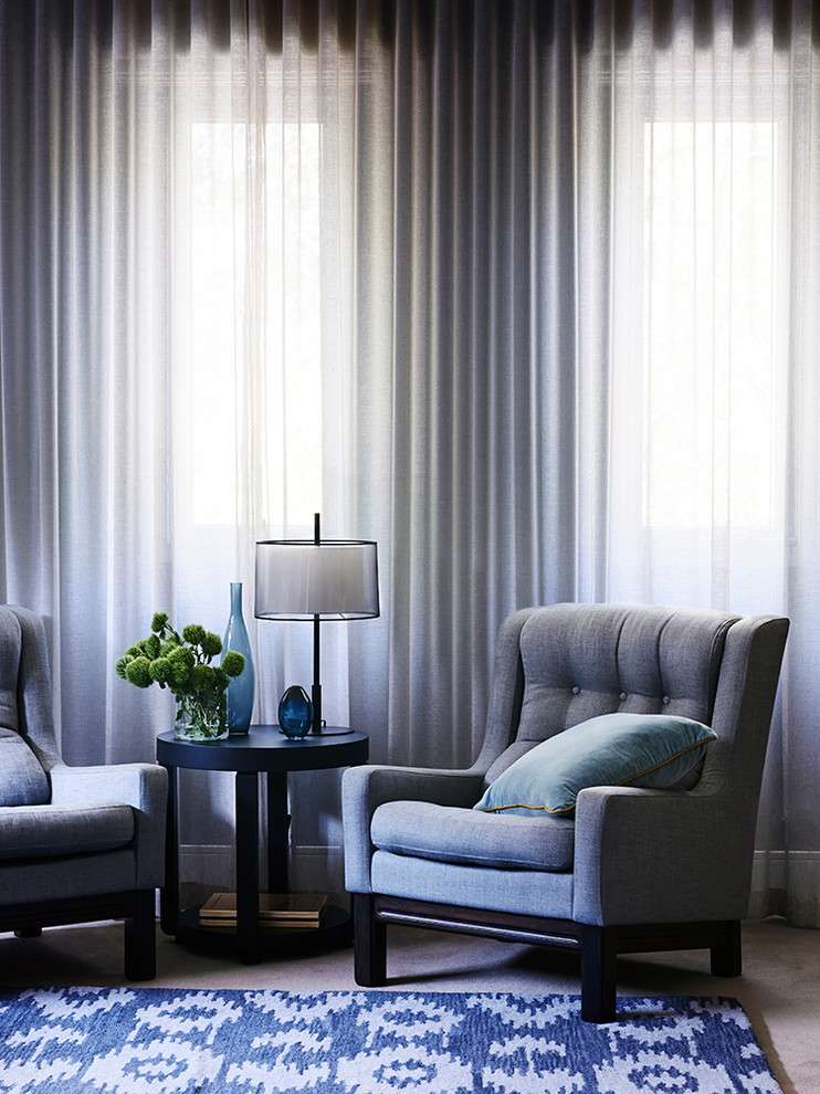 Trendy carpeted bedroom photo in Melbourne with blue walls