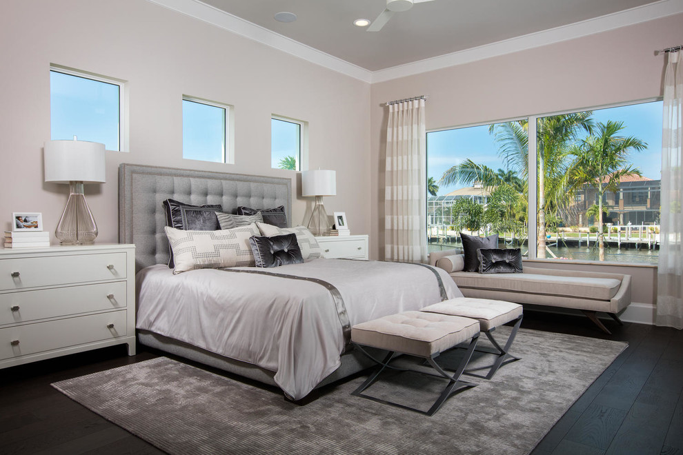 Inspiration for a large contemporary master dark wood floor and gray floor bedroom remodel in Miami with gray walls