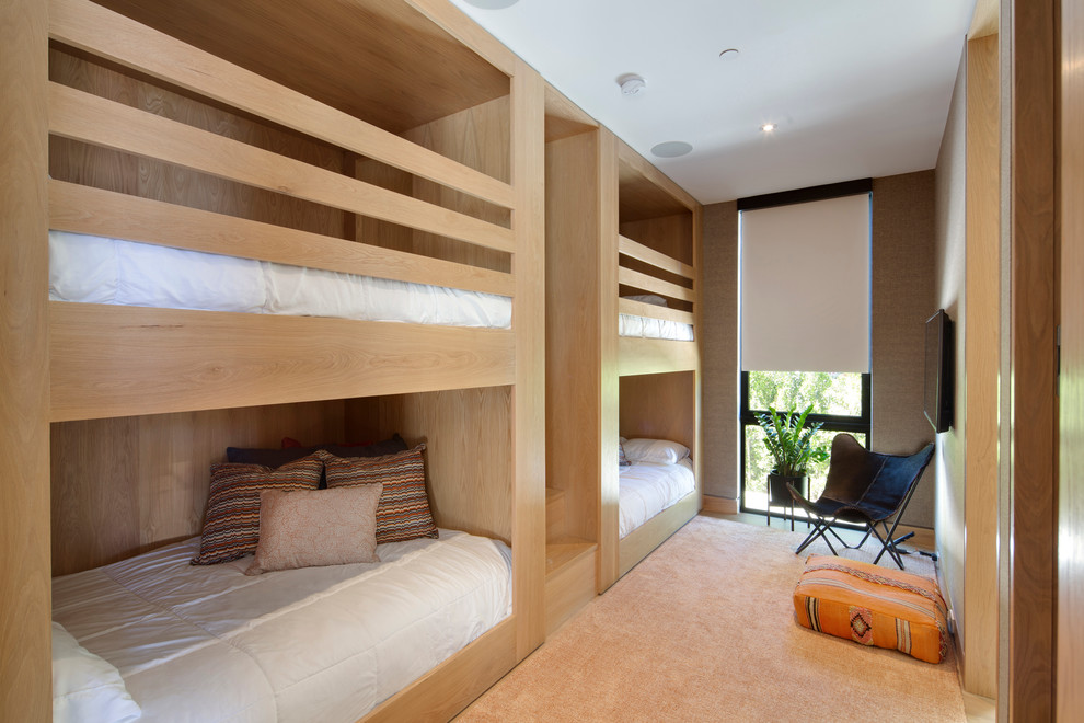 This is an example of an expansive contemporary bedroom in Los Angeles.