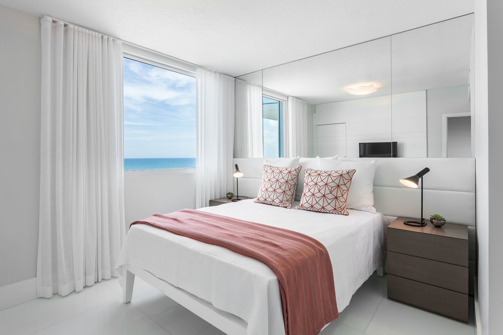 Photo of a medium sized contemporary guest bedroom in Miami with white walls, ceramic flooring, white floors and no fireplace.