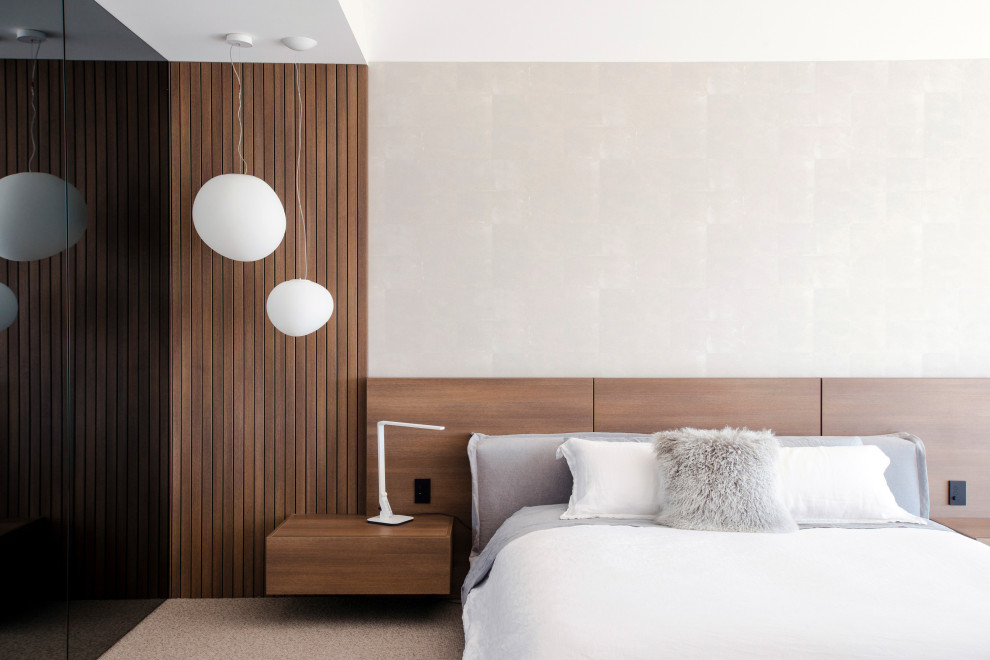Modernes Schlafzimmer mit grauer Wandfarbe und grauem Boden in Brisbane