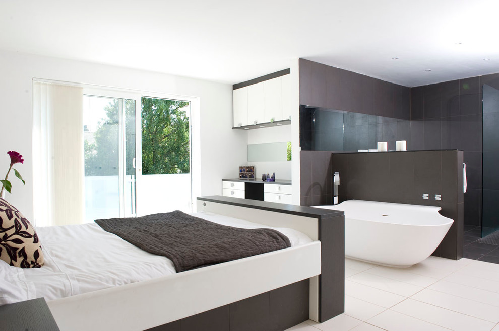 Example of a trendy bedroom design in Cardiff