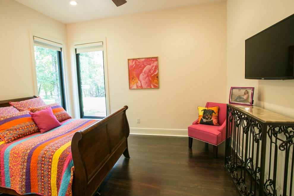 Photo of a small classic guest bedroom in Houston with white walls and vinyl flooring.