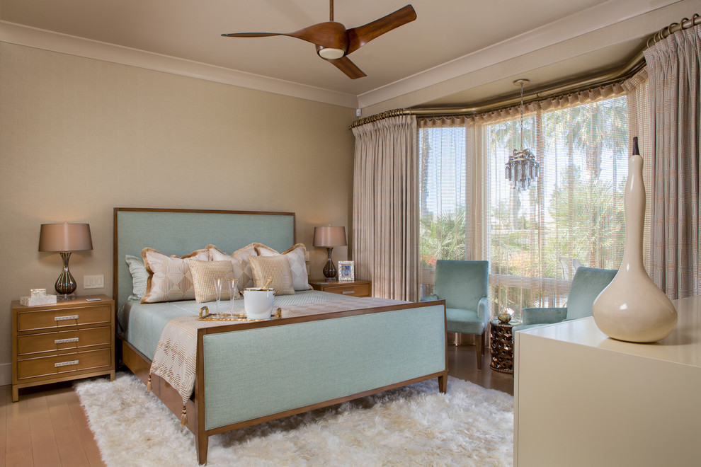 Inspiration for a medium sized classic master bedroom in Orange County with beige walls, light hardwood flooring and brown floors.