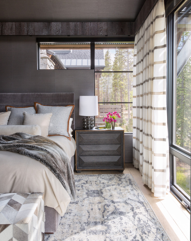 Inspiration for a contemporary master bedroom in Denver with grey walls, light hardwood flooring, beige floors, a wallpapered ceiling and wallpapered walls.
