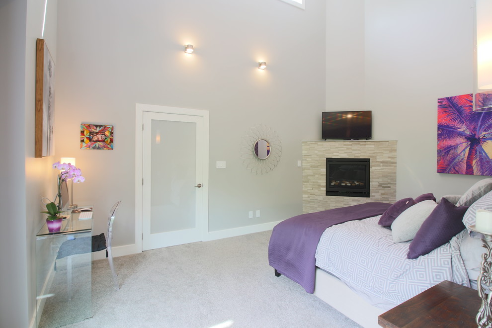 Photo of a large contemporary master bedroom in Calgary with grey walls, carpet, no fireplace and beige floors.