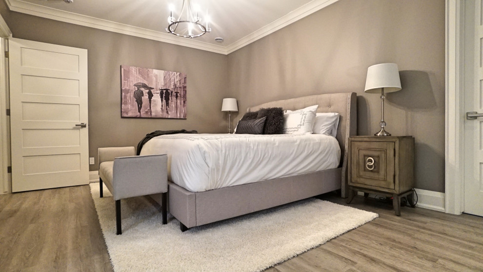 Imagen de dormitorio principal actual grande con paredes grises, suelo vinílico y suelo gris