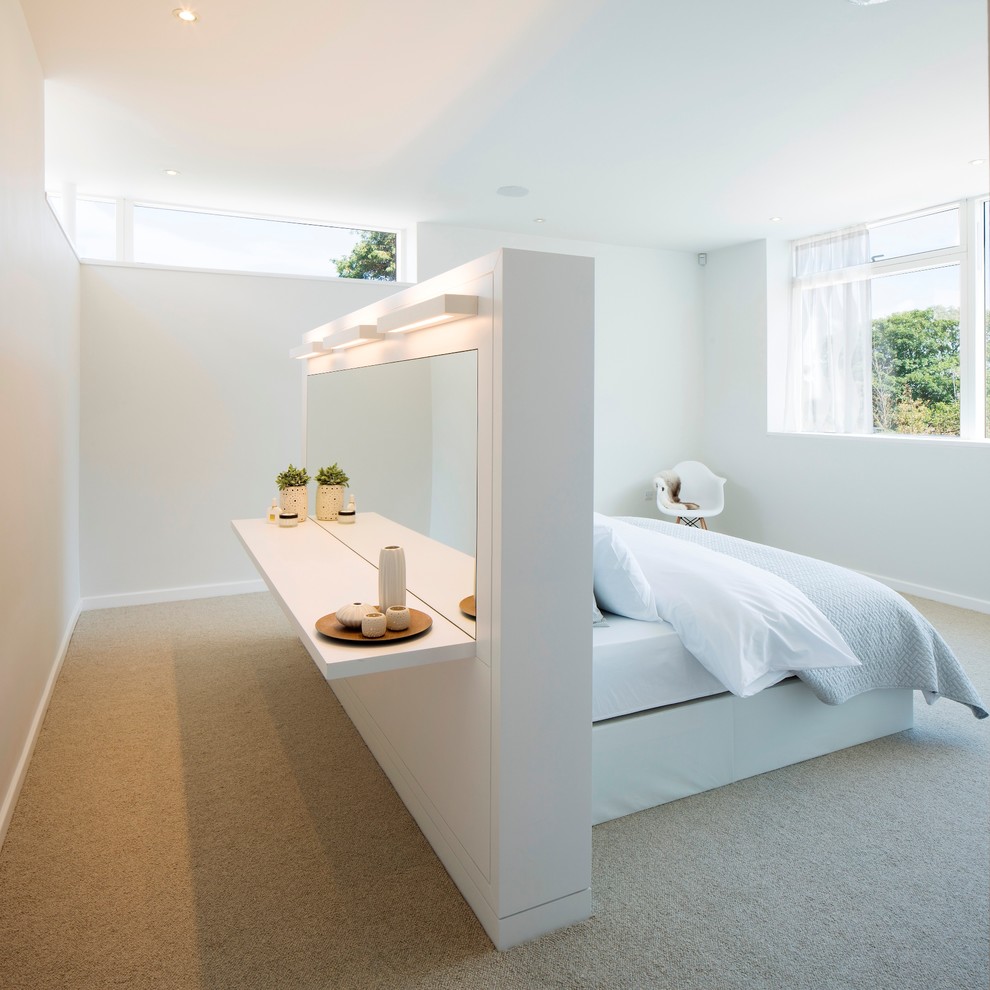 Inspiration for a contemporary bedroom remodel in Sussex