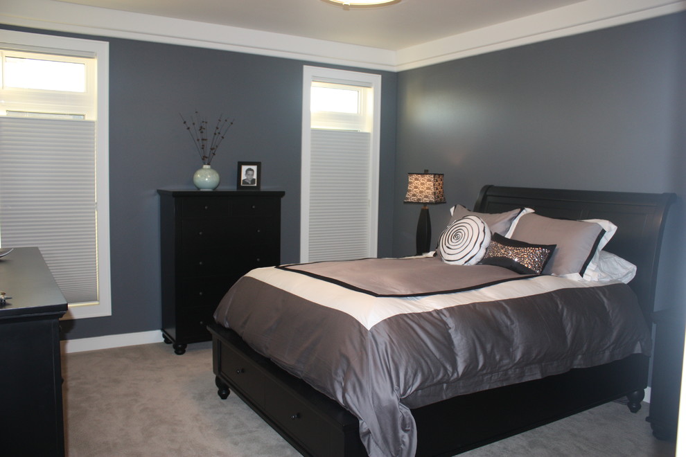 This is an example of a medium sized contemporary guest bedroom in Other with grey walls, carpet and no fireplace.