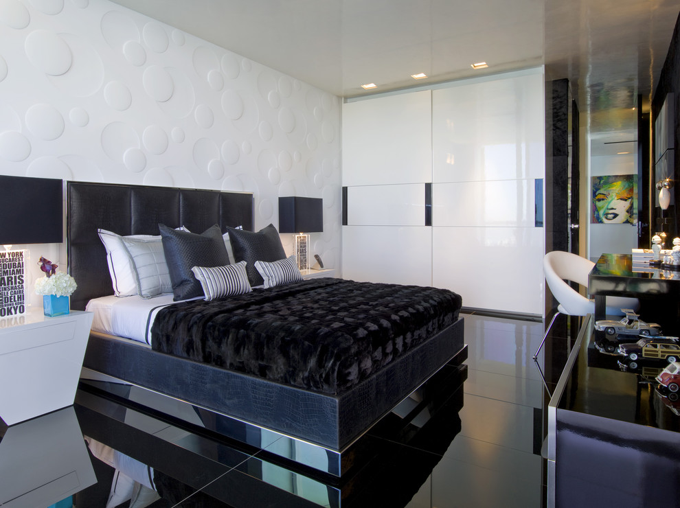 Cette photo montre une chambre moderne avec un mur blanc, aucune cheminée, un sol en carrelage de céramique et un sol noir.