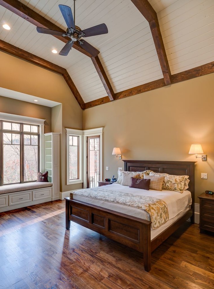 Example of a mid-sized arts and crafts master dark wood floor bedroom design in Atlanta with brown walls and no fireplace