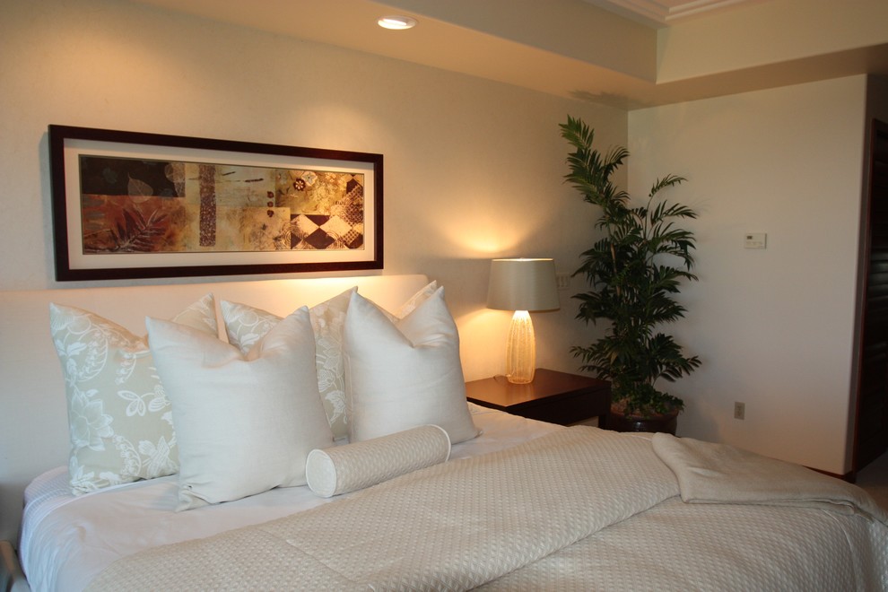 Inspiration for a small tropical master carpeted bedroom remodel in Hawaii with white walls