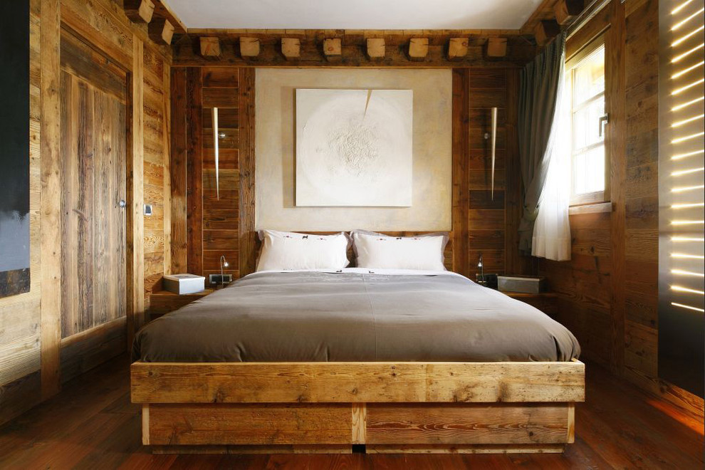 Immagine di una camera da letto rustica