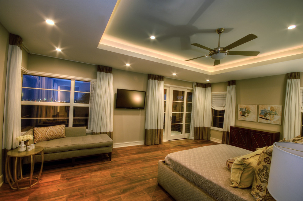 Contemporary master bedroom in Austin with grey walls, dark hardwood flooring and no fireplace.