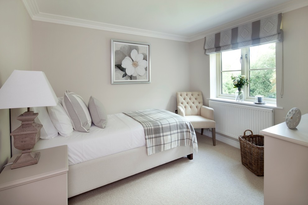 Small classic guest bedroom in Berkshire with carpet and grey walls.