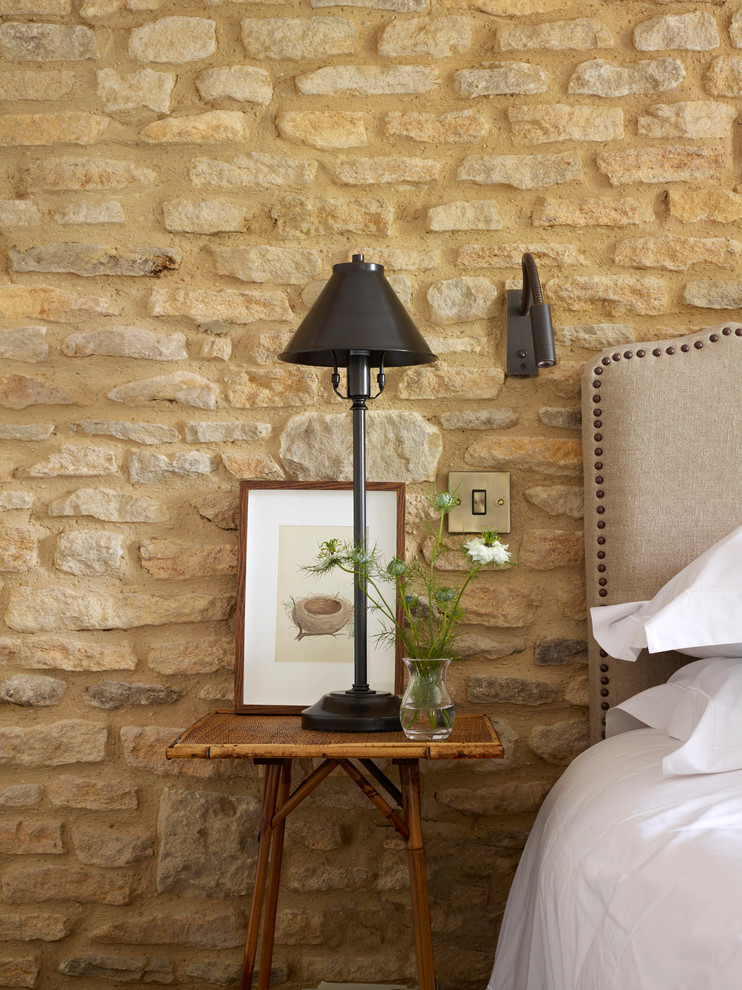 Inspiration for a small cottage master bedroom remodel in Oxfordshire with white walls