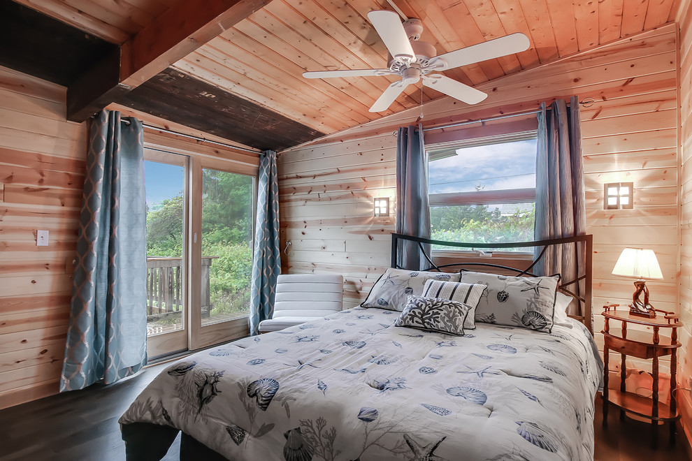 Example of a mid-sized mountain style guest dark wood floor bedroom design in Grand Rapids
